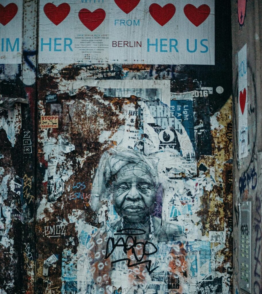 Detailed portrait of a woman in Berlin's urban graffiti scene, showcasing vibrant street art.